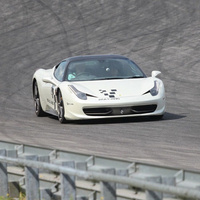 Driving behind the wheel of a Ferrari 458 Italia around the track (2 laps)