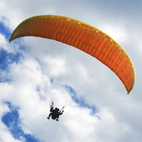 Tandem paraglider flight with Acrobatics with filming
