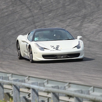 Driving behind the wheel of a Ferrari 458 Italia on the Poznań Główny circuit (2 laps)