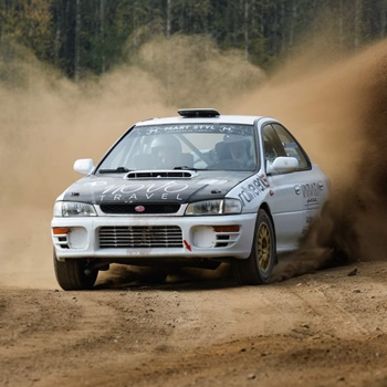 Driving behind the wheel of a Subaru Impreza on a gravel track (10 laps)